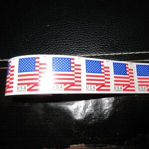 Roll of 100 forever stamps.